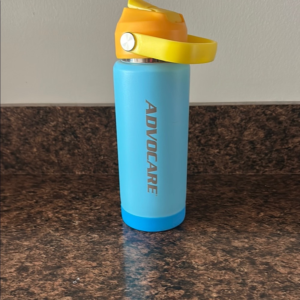 Advocare Blue Water Bottle with Yellow Lid